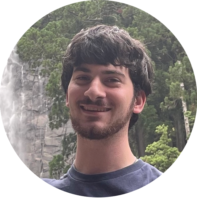 Aaron at Nachi Falls in Nachikatsuura, Wakayama Prefecture, Japan, smiling in front of waterfall